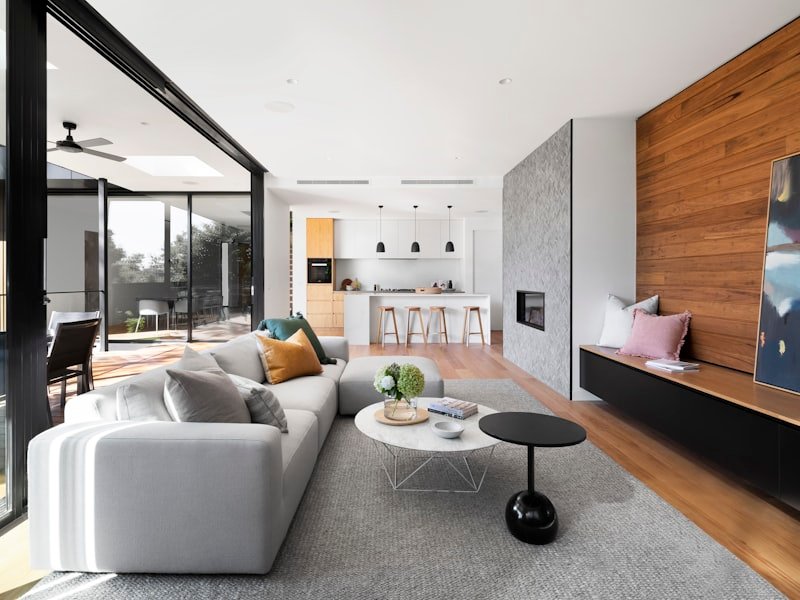 Cohesive open-plan whole-home interior with unified material palette